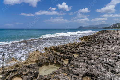  Ko Olina Beach Park, Leeward Coast of Oahu, Honolulu, Hawaii geology. Beachrock is a friable to well-cemented sedimentary rock. Salt weathering Tafoni
 photo