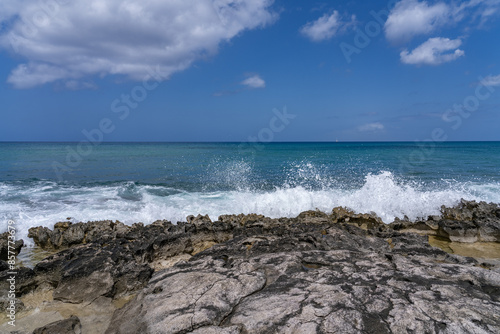  Ko Olina Beach Park, Leeward Coast of Oahu, Honolulu, Hawaii geology. Beachrock is a friable to well-cemented sedimentary rock. Salt weathering Tafoni
 photo