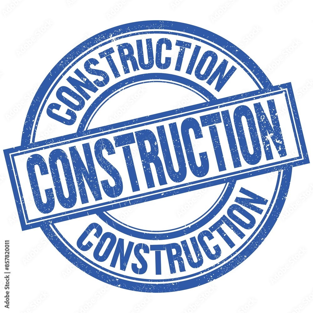 CONSTRUCTION written word on blue stamp sign CONSTRUCTION written word on blue stamp sign