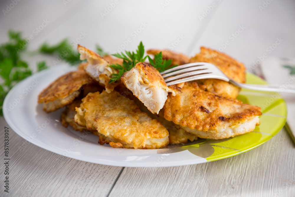 crispy golden fish fillet fried in batter crispy golden fish fillet fried in batter