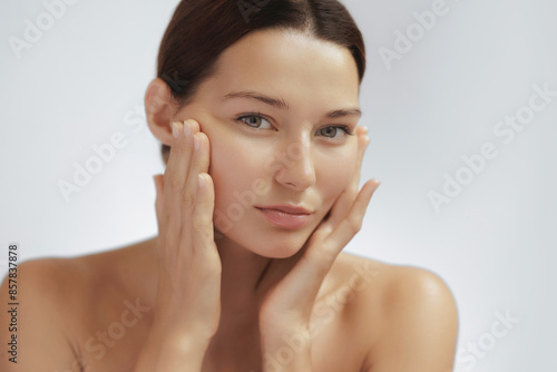 Photos Young Asian Woman Inspecting Skin for Face Lift and Plastic Surgery