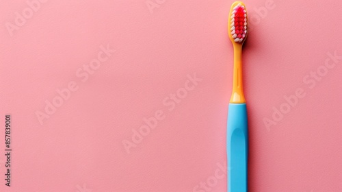  A blue toothbrush on a white background with red bristles at the top, in a minimalistic style, aesthetic, in a photo studio,