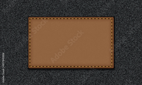 Black jeans texture. Denim background. Leather badge, denim label.