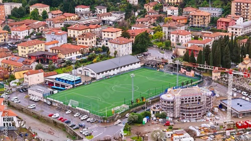 Football field in small town Menaggio on lake Como in Italy, Aerial view photo