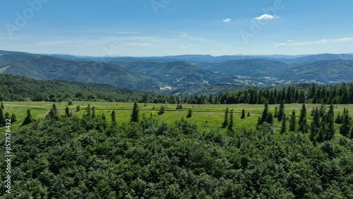 Drone view in Beskid mountains, Blatnia. Summer green forest on Blatnia. Beskid mountains in Jaworze. Drone fly above green mountains in summer. Polish green mountains and hills aerial drone photo photo