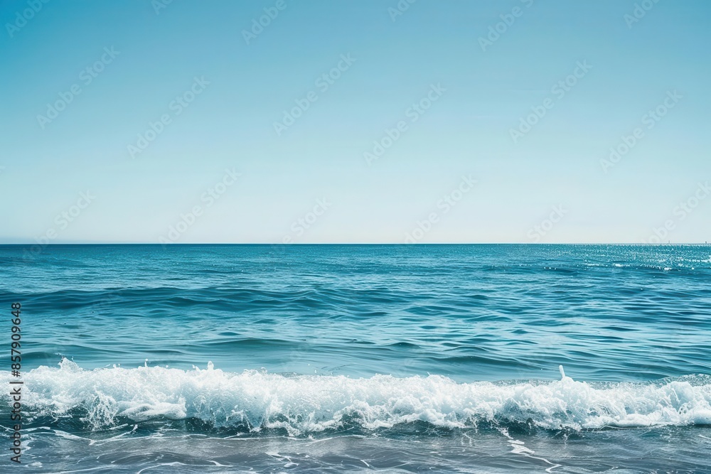 tranquil seascape with calm waves and clear blue sky serene ocean view nature photography