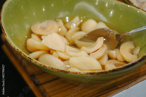 Candied snakefruit - Zalacca Fruit in sweet sugar soup for dessert. Concept for Hotel Restaurant Wedding Buffet. photo