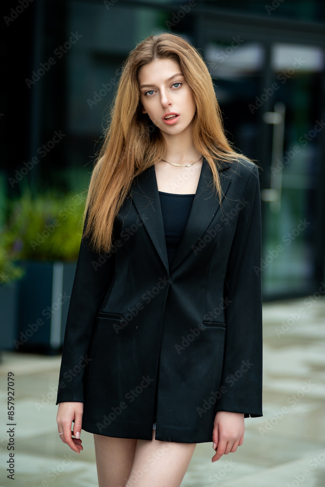 portrait of a beautiful girl in a business suit in the city portrait of a beautiful girl in a business suit in the city