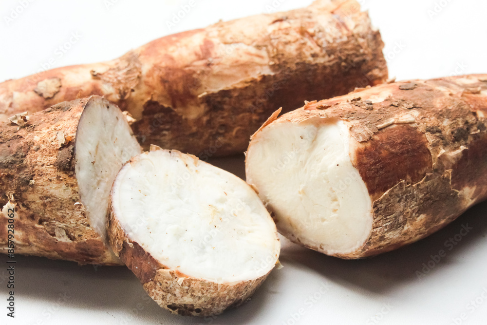 close up of raw cassava pieces isolated on white background close up of raw cassava pieces isolated on white background