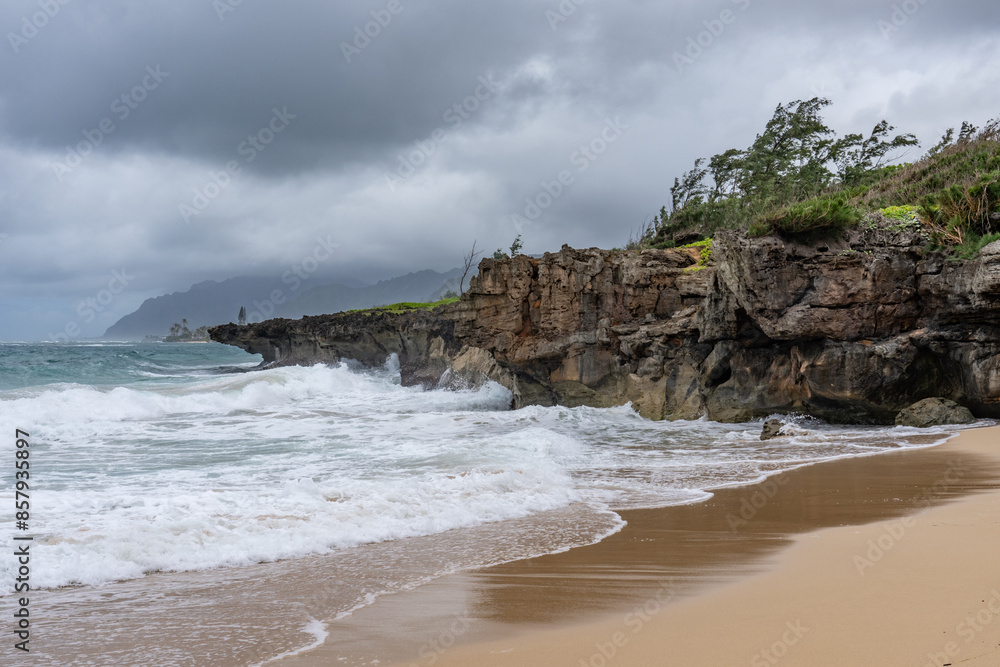Older dune deposits, Eolianite or aeolianite, sand dune rock, Pounder’s Beach,Oahu's North Shore, Windward Coast,Honolulu, Hawaii. Older dune deposits, Eolianite or aeolianite, sand dune rock, Pounder’s Beach,Oahu's North Shore, Windward Coast,Honolulu, Hawaii.