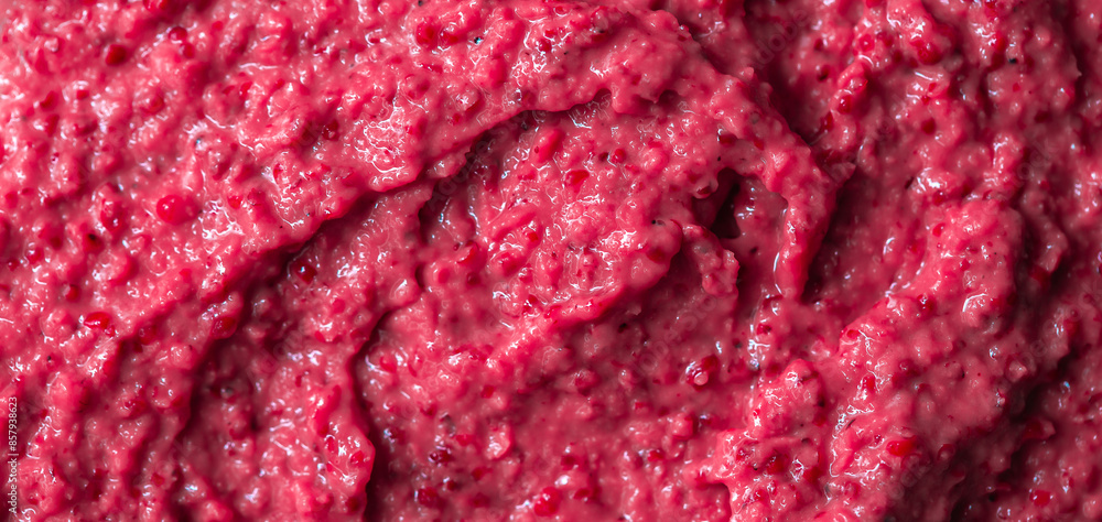 Berry yoghurt ice cream. Smoothies from fresh fruits and berries. Ice cream texture. Delicious sweet dessert close-up as a background. Berry yoghurt ice cream. Smoothies from fresh fruits and berries. Ice cream texture. Delicious sweet dessert close-up as a background.