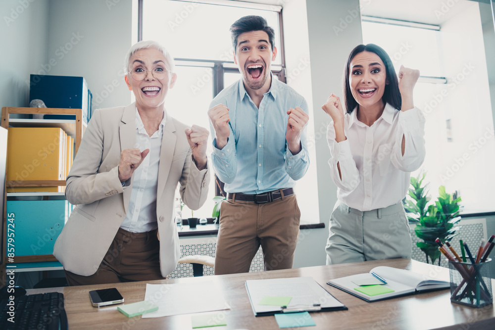 Fototapeta premium Photo of two employees mature boss woman winning office team meeting professional collaborating working together in modern workplace
