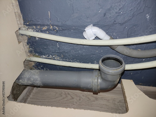 Old drain pipe with washing machine drainage hose, Plumbing connection