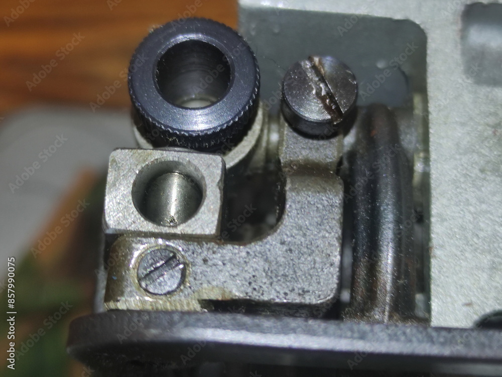 Old sewing machine needle drive mechanism closeup Old sewing machine needle drive mechanism closeup
