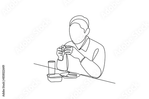 Continuous one line drawing young man having dinner alone. Family having meal around kitchen table together. Dinner minimalist concept. Single line draw design vector graphic illustration