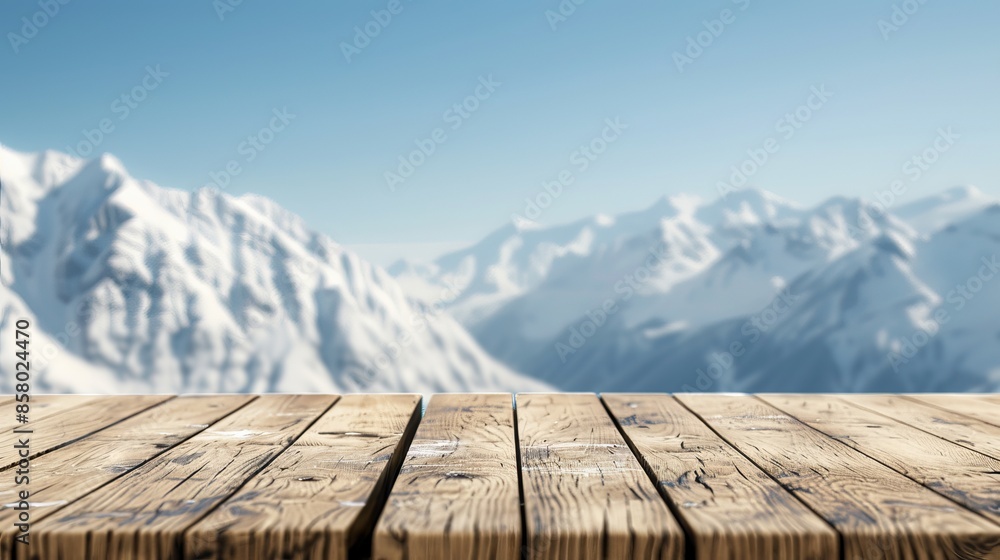 Wooden deck overlooking stunning snow-covered mountain panorama under clear blue sky, perfect for winter and outdoor themes. Wooden deck overlooking stunning snow-covered mountain panorama under clear blue sky, perfect for winter and outdoor themes.