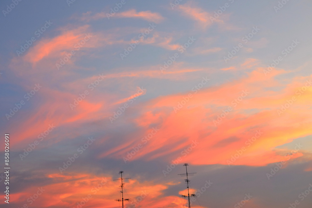 Low angle view of dramatic sky during sunset over the city Low angle view of dramatic sky during sunset over the city