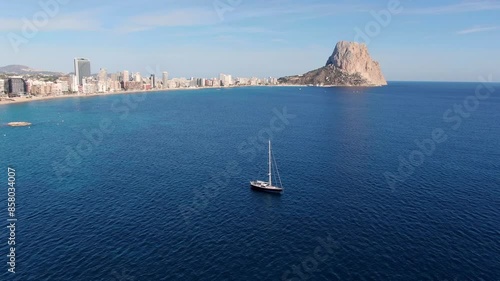 Calpe con el Peñon Ifach y barco Alicante con drone