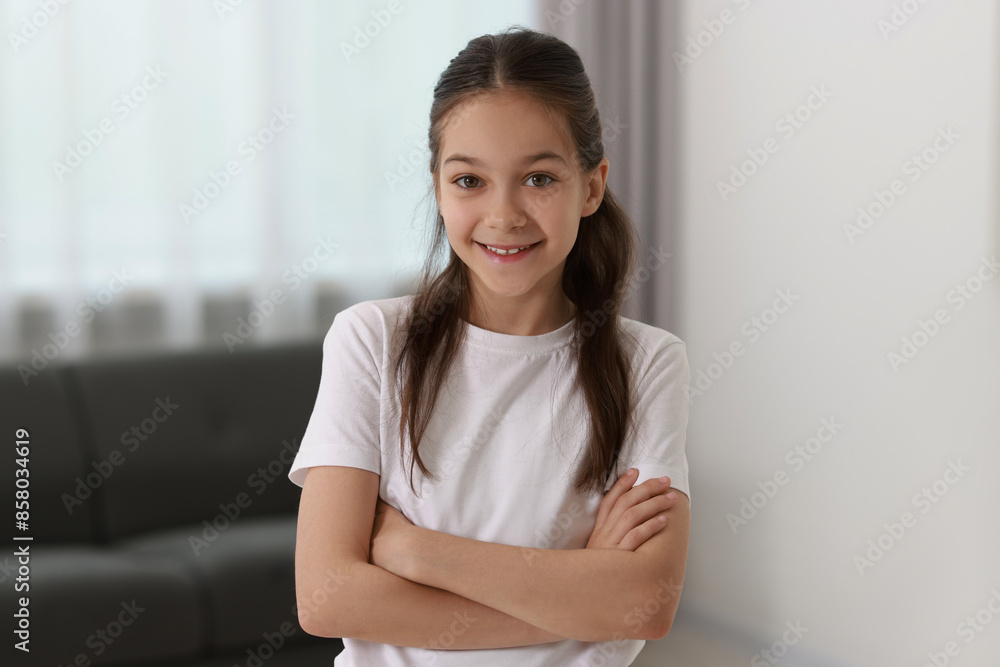 Portrait of happy little girl indoors. Cute child Portrait of happy little girl indoors. Cute child