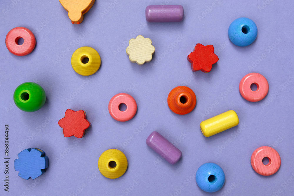 Children colorful wooden blocks flat lay background. Creativity concept, playing first toy.