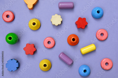 Obraz na płótnie Children colorful wooden blocks flat lay background. Creativity concept, playing first toy. w salonie