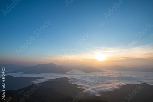 On the top of the mountain in the morning with beautiful mist.