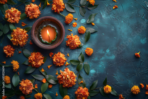 Traditional Diwali background featuring an urli bowl with flowers, realistic and with space for text,
