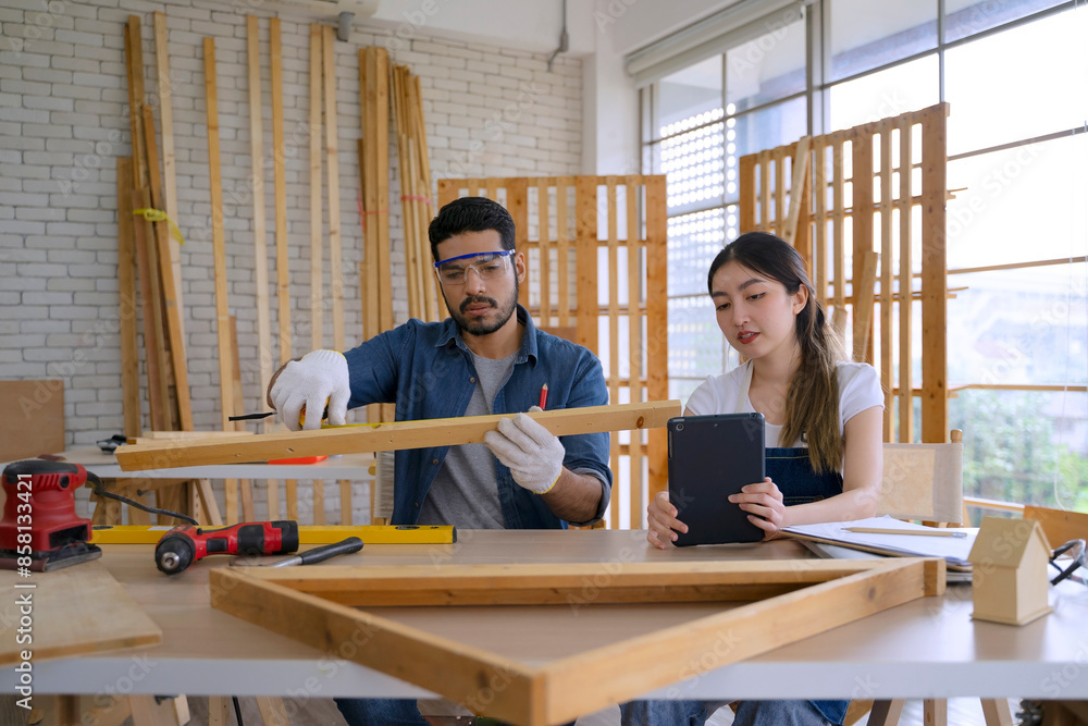 Carpenters are working at woodshop. Carpenters are working at woodshop.