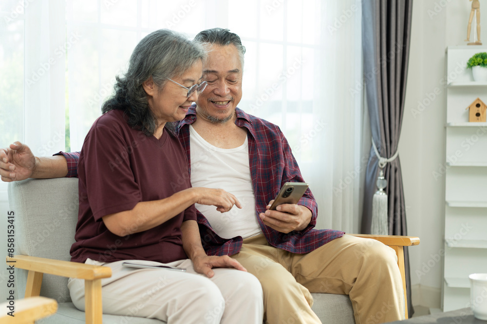 © pixs4u - Senior couple use smartphone in social network and selfie with happy together