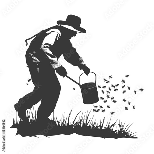 Silhouette of farmer sowing seeds from bucket in grassy field.
