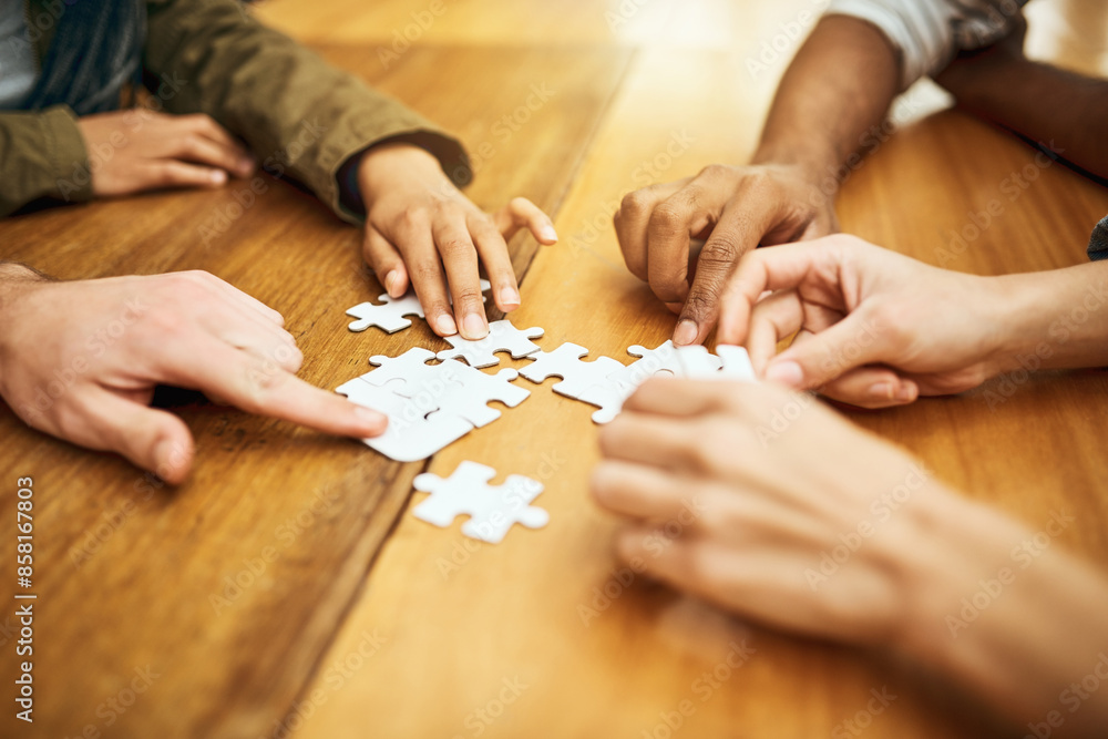 Puzzle, meeting and hands of business people for teamwork, collaboration and working together. Company, diversity and workers with jigsaw for problem solving, challenge and cooperation in office Puzzle, meeting and hands of business people for teamwork, collaboration and working together. Company, diversity and workers with jigsaw for problem solving, challenge and cooperation in office