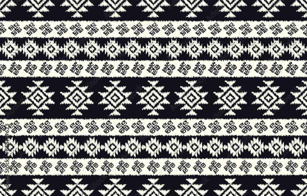 Geometrics Ikat ethnic design.Ikat seamless pattern in tribal, folk embroidery abstract wave art. ornament print. Ikat Design for wallpaper,carpet, clothing, fashion, fabric Geometrics Ikat ethnic design.Ikat seamless pattern in tribal, folk embroidery abstract wave art. ornament print. Ikat Design for wallpaper,carpet, clothing, fashion, fabric