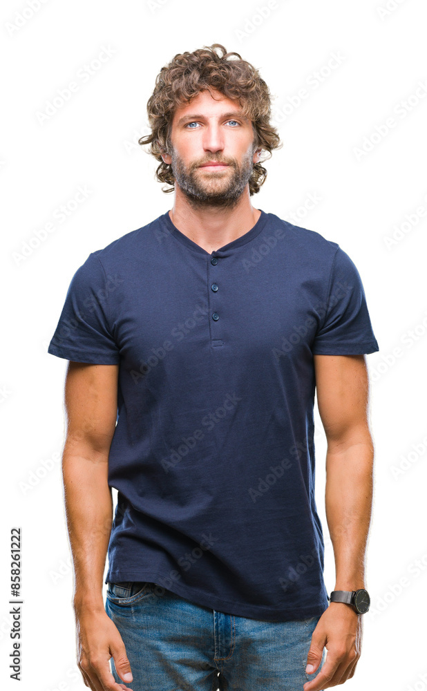 Fototapeta premium Handsome hispanic model man over isolated background with serious expression on face. Simple and natural looking at the camera.