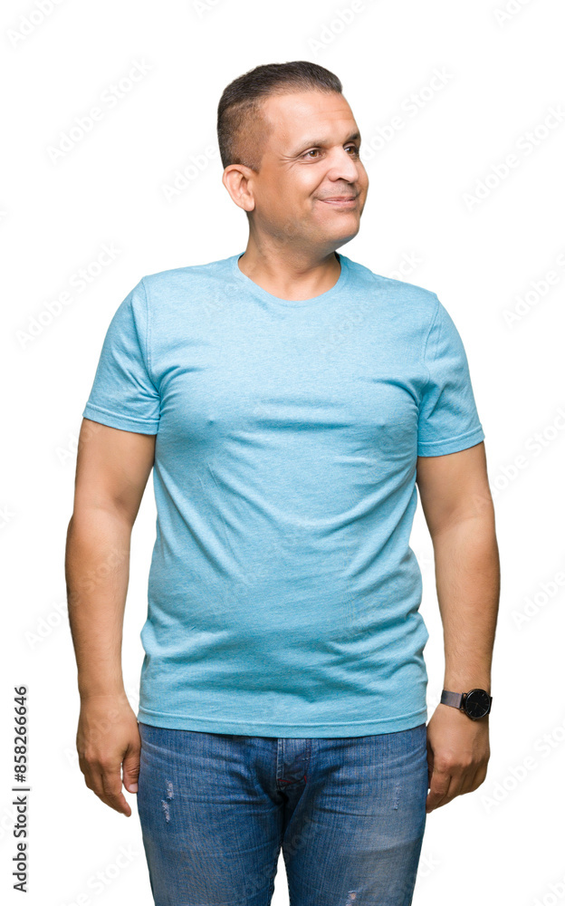 Middle age arab man wearing blue t-shirt over isolated background smiling looking side and staring away thinking. Middle age arab man wearing blue t-shirt over isolated background smiling looking side and staring away thinking.