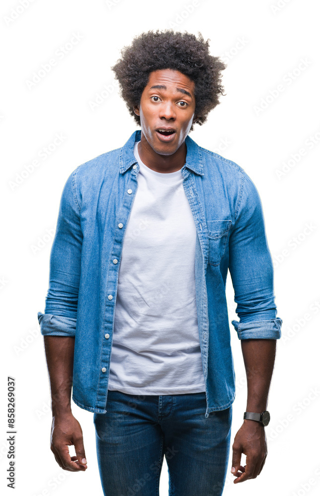Afro american man over isolated background afraid and shocked with surprise expression, fear and excited face. Afro american man over isolated background afraid and shocked with surprise expression, fear and excited face.