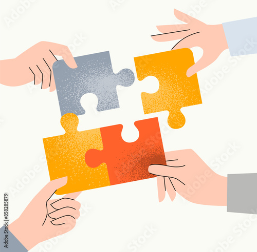 Four hands putting puzzle pieces. Teamwork, cooperation, business work