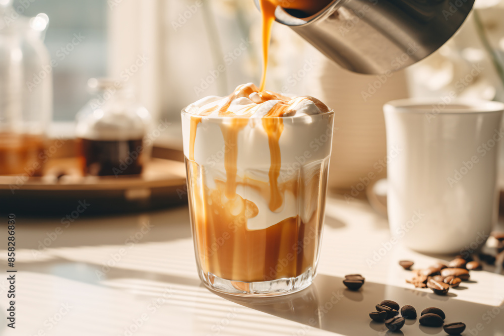 Close up of caramel sauce being poured on coffee drink with cream Close up of caramel sauce being poured on coffee drink with cream