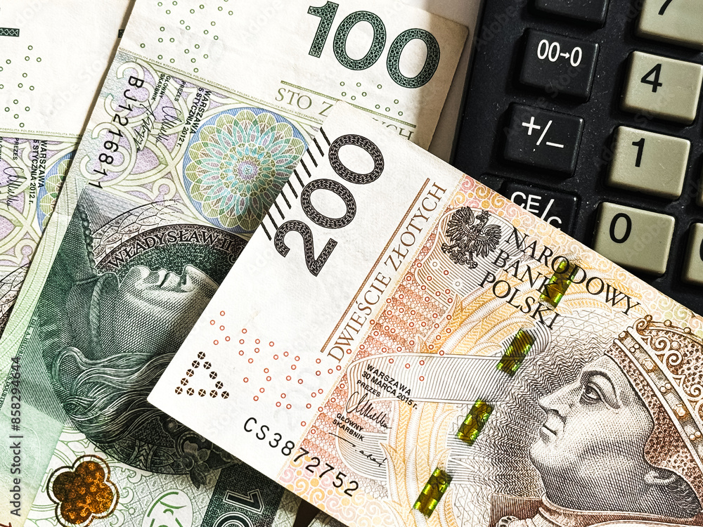 Obraz premium Polski złoty, polskie banknoty, polska waluta, złotówki, gotówka.