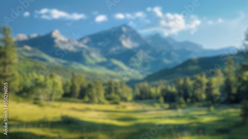 Blur background of spring nature with park or grass lawn with sun ray in summer. Landscape of grass field, cloud and blue sky in bright sunny day. Green environmental public park concept. Spate.