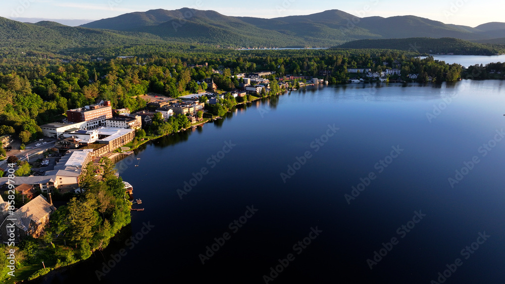 Aerial view of the shore of Mirror Lake in the morning in Lake Placid, New York Aerial view of the shore of Mirror Lake in the morning in Lake Placid, New York