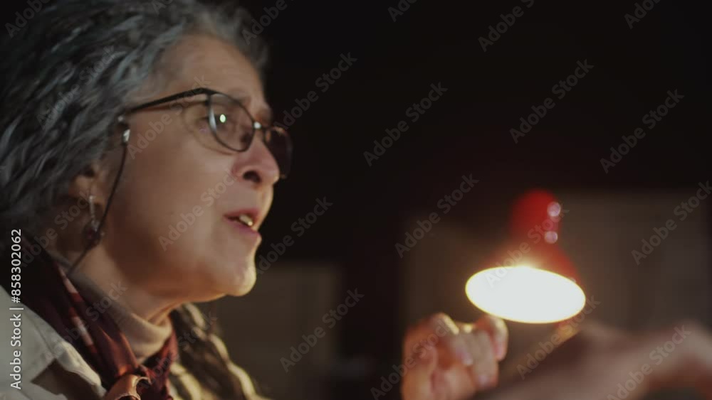 Emotional mature female director explaining how to play role and perform on stage to actor while working in theatre Emotional mature female director explaining how to play role and perform on stage to actor while working in theatre