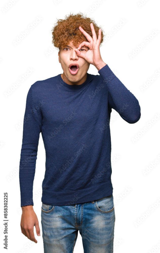 Young handsome man with afro hair doing ok gesture shocked with surprised face, eye looking through fingers. Unbelieving expression. Young handsome man with afro hair doing ok gesture shocked with surprised face, eye looking through fingers. Unbelieving expression.