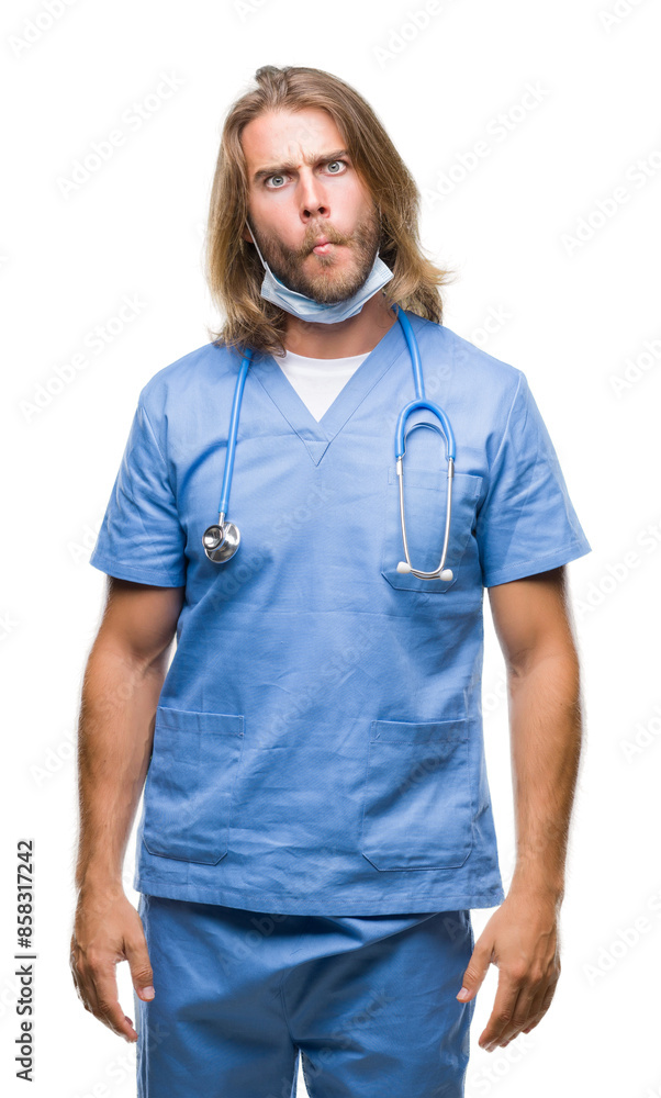 Young handsome doctor man with long hair over isolated background making fish face with lips, crazy and comical gesture. Funny expression. Young handsome doctor man with long hair over isolated background making fish face with lips, crazy and comical gesture. Funny expression.