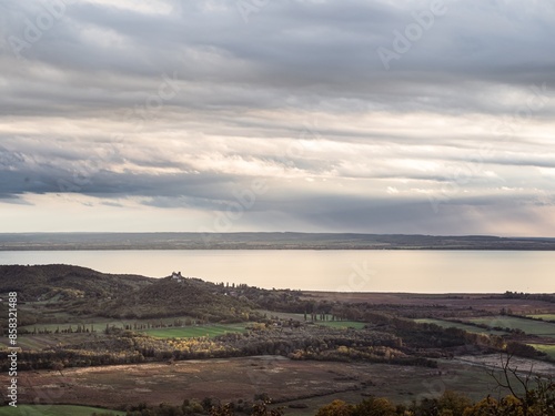 Panoramic view of the Szigliget mountain and the lake Balaton on Balatonfelvidék area of Hungary with vineyards wine region of Balaton, near sunset, pink colors