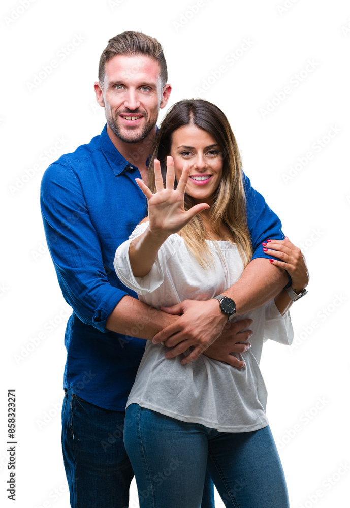 Young couple in love over isolated background showing and pointing up with fingers number five while smiling confident and happy. Young couple in love over isolated background showing and pointing up with fingers number five while smiling confident and happy.