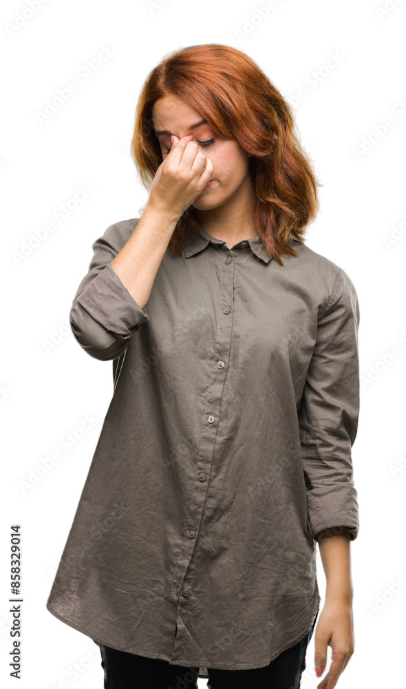 Young beautiful woman over isolated background tired rubbing nose and eyes feeling fatigue and headache. Stress and frustration concept. Young beautiful woman over isolated background tired rubbing nose and eyes feeling fatigue and headache. Stress and frustration concept.