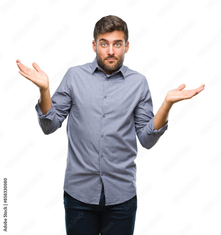 Young handsome man over isolated background clueless and confused expression with arms and hands raised. Doubt concept. Young handsome man over isolated background clueless and confused expression with arms and hands raised. Doubt concept.