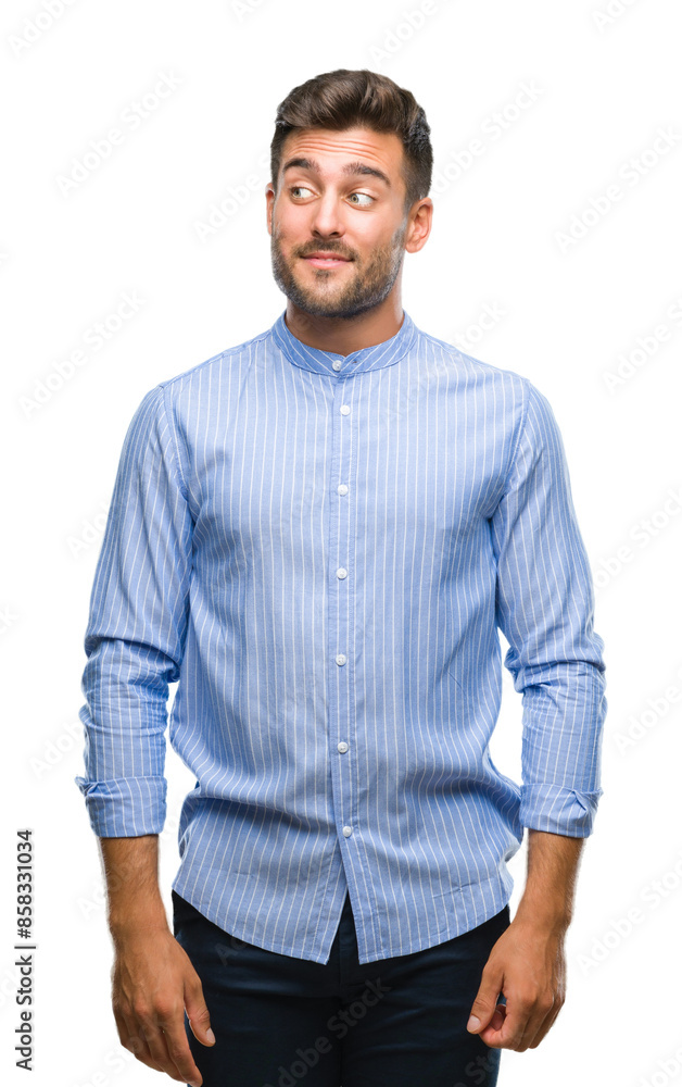Fototapeta premium Young handsome man over isolated background smiling looking side and staring away thinking.