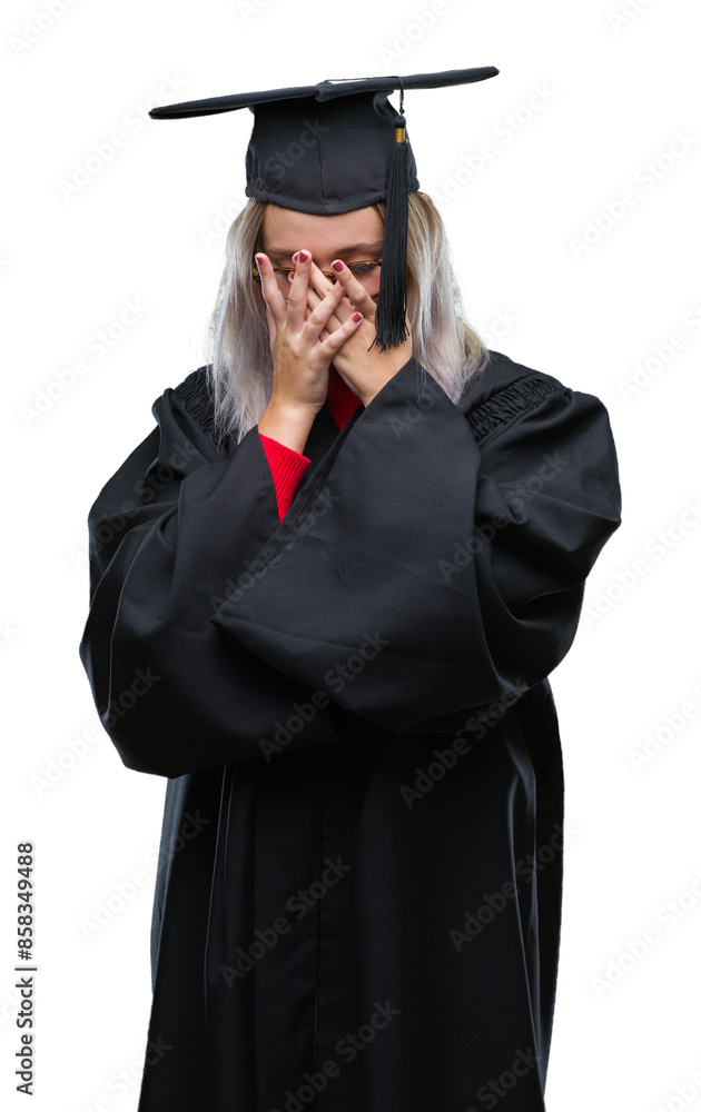 Young blonde woman wearing graduate uniform over isolated background with sad expression covering face with hands while crying. Depression concept. Young blonde woman wearing graduate uniform over isolated background with sad expression covering face with hands while crying. Depression concept.