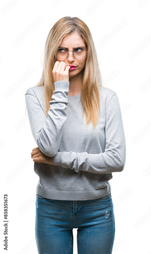 Young beautiful blonde woman wearing glasses over isolated background looking stressed and nervous with hands on mouth biting nails. Anxiety problem. Young beautiful blonde woman wearing glasses over isolated background looking stressed and nervous with hands on mouth biting nails. Anxiety problem.